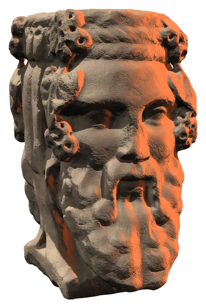 Volto della statua di Giano illuminato di arancio